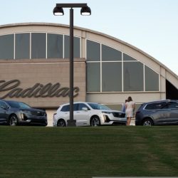 A growing car dealership would like to expand